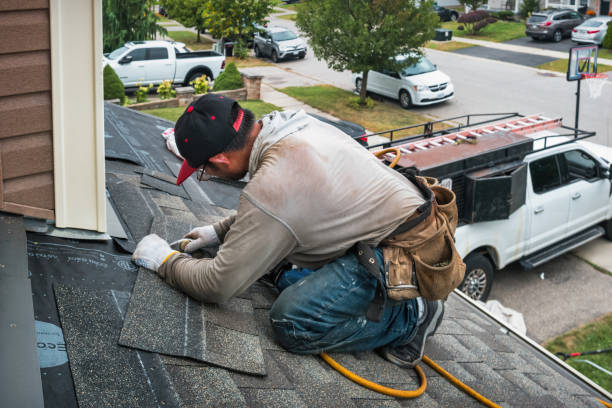 Professional Emergency Roof Repair technician working in Roxbury, MA